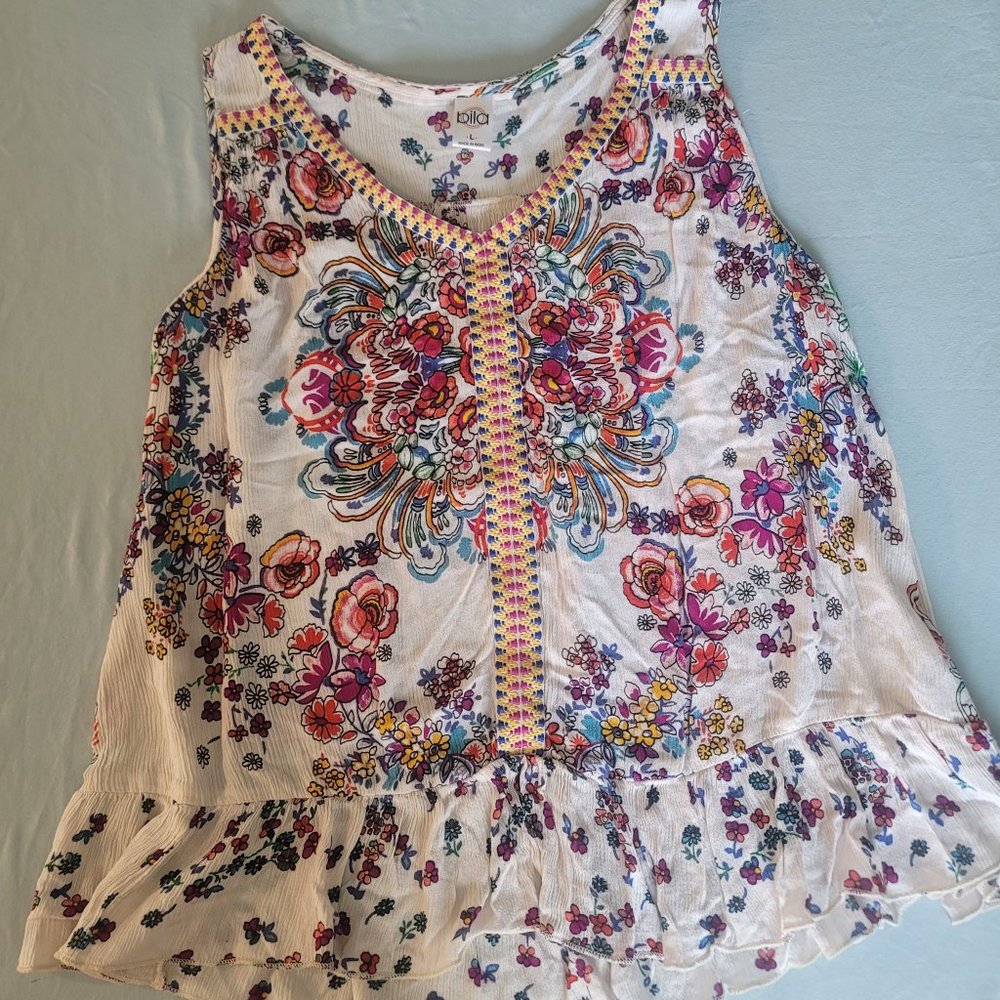 Sleeveless White Top with multi color floral pattern